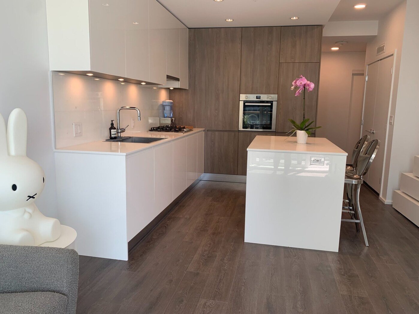 Kitchen with gas range and built-in oven